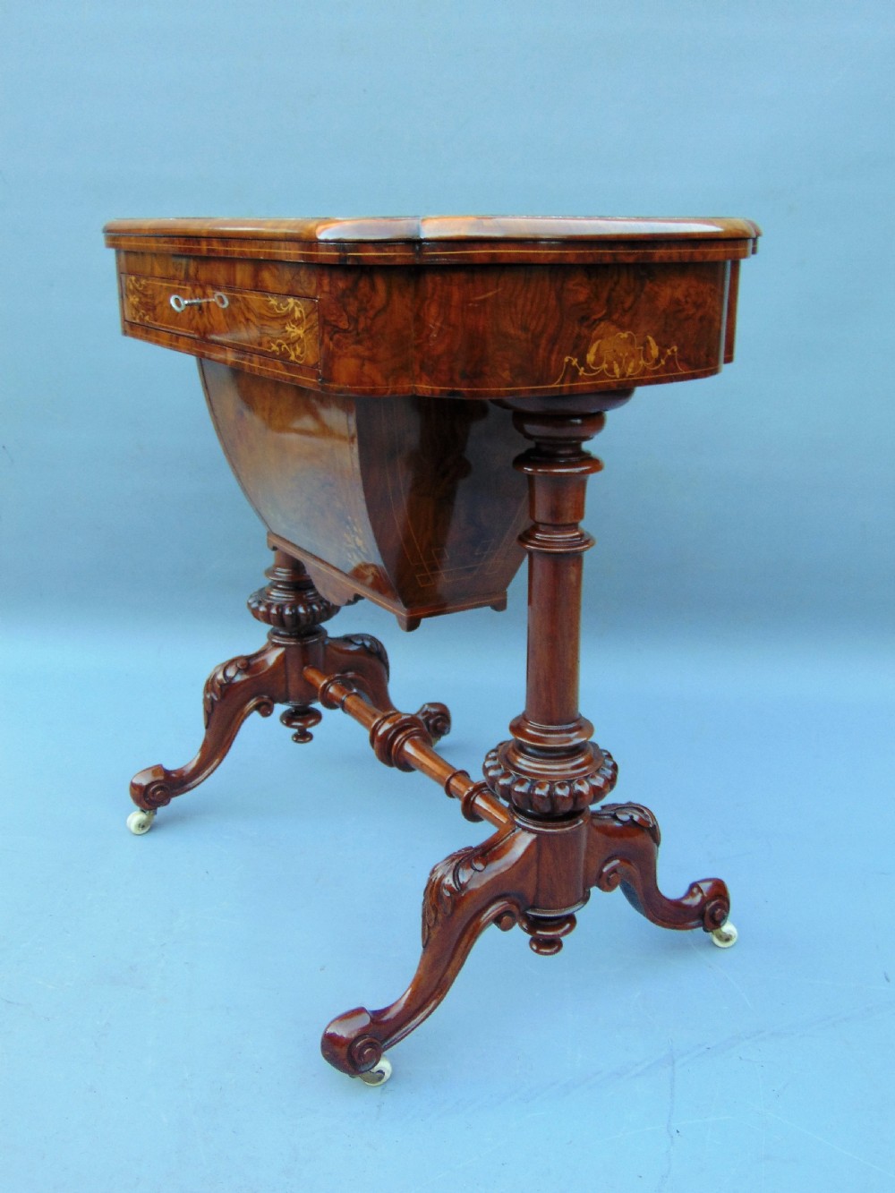 A fine English inlaid Burr Walnut Sewing games Table View VI