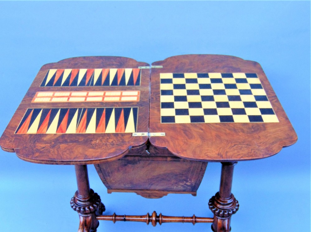 A fine English inlaid Burr Walnut Sewing games Table View VII