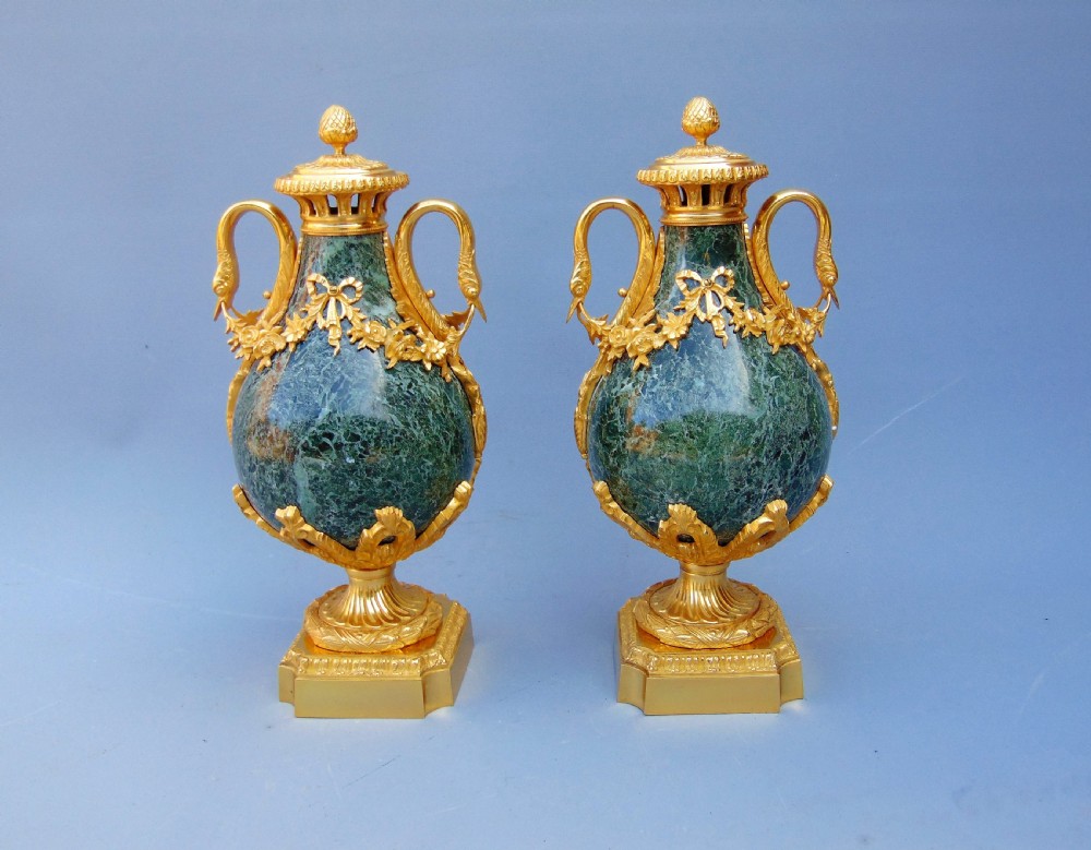 A fine pair of marble cassolettes 