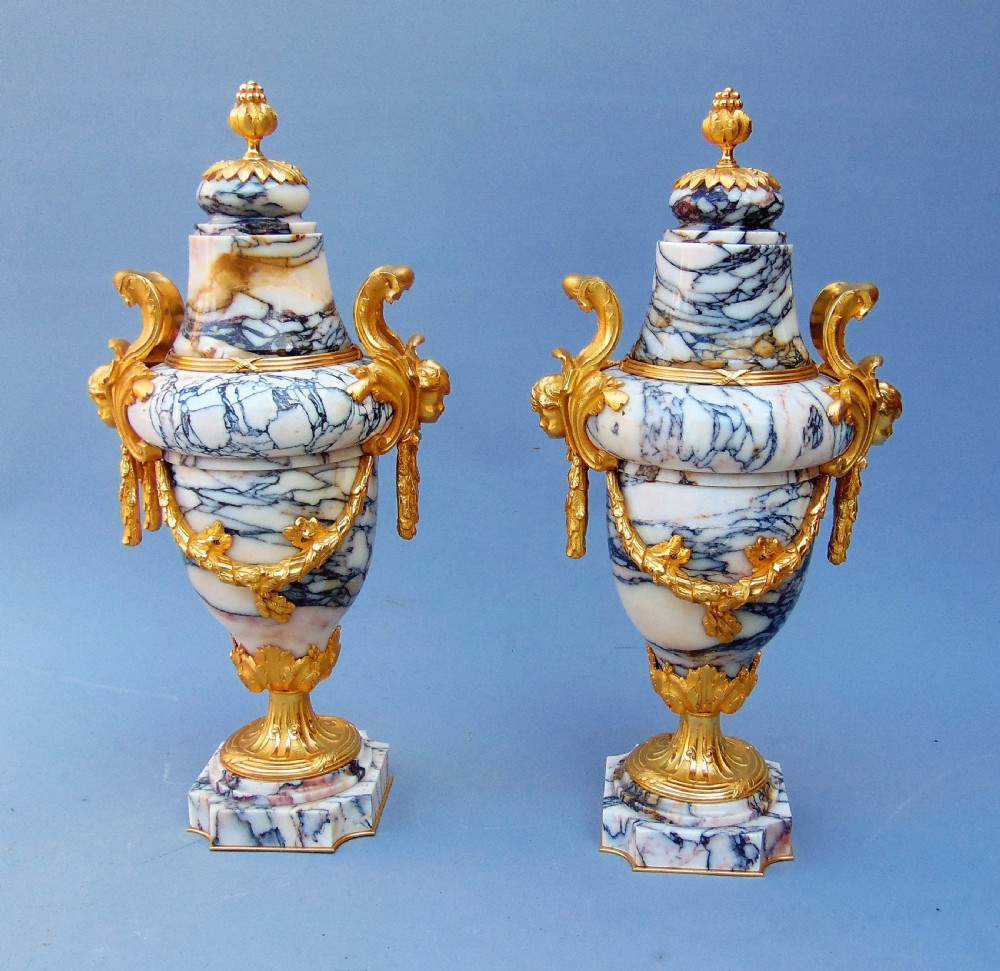 A stunning pair of marble cassolettes 