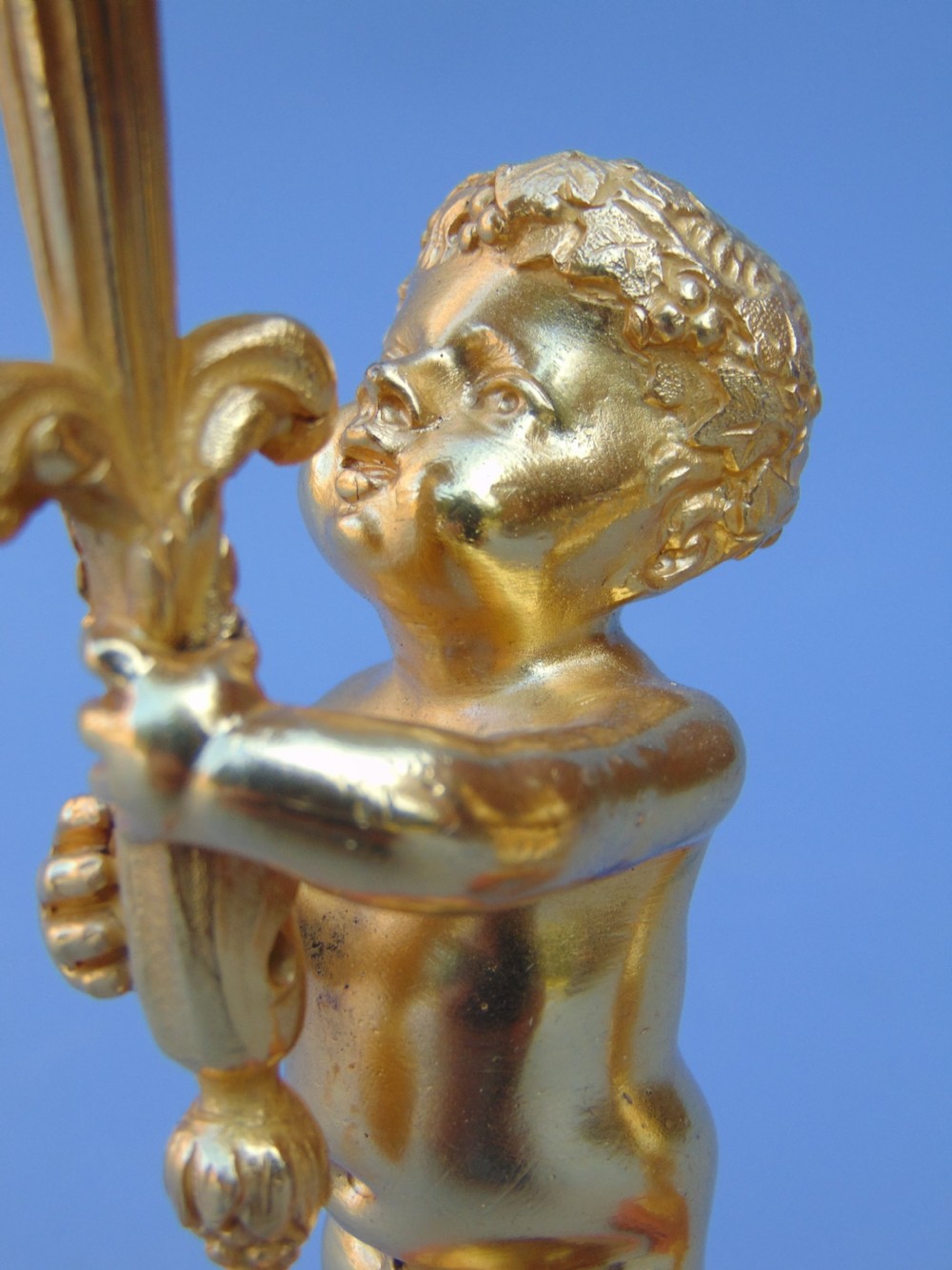 A small pair of ormolu candlesticks  View V