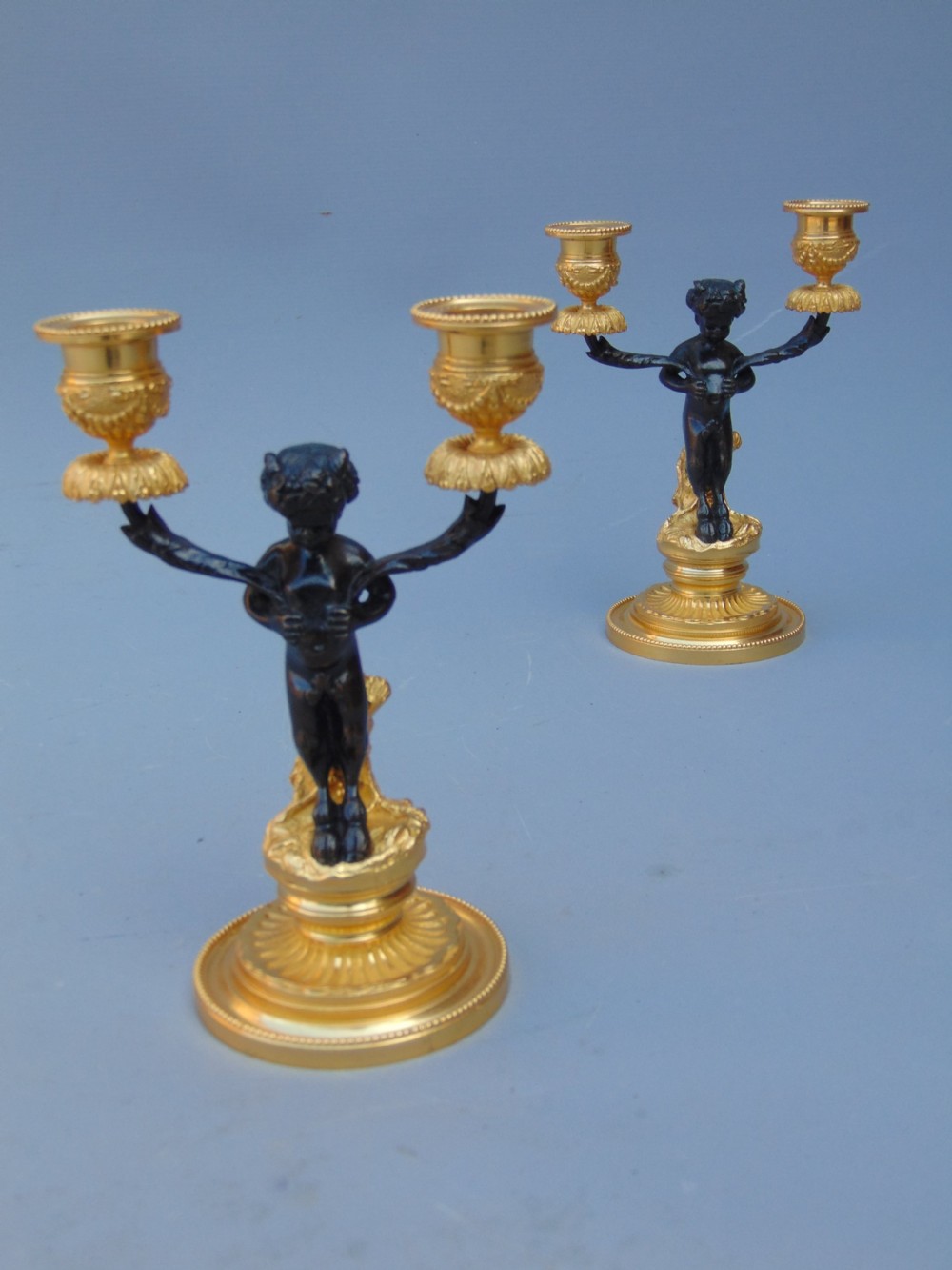 A pretty pair of cherub Candlesticks  View III