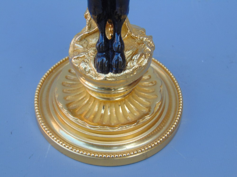 A pretty pair of cherub Candlesticks  View VI