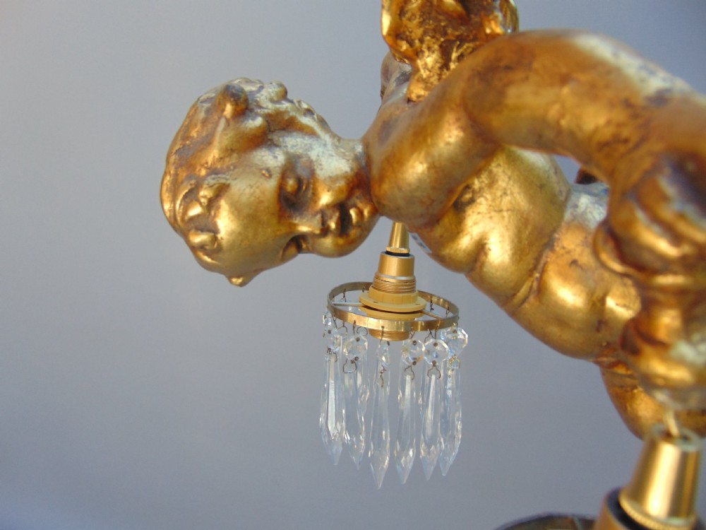A gilded cherub ceiling light  View V