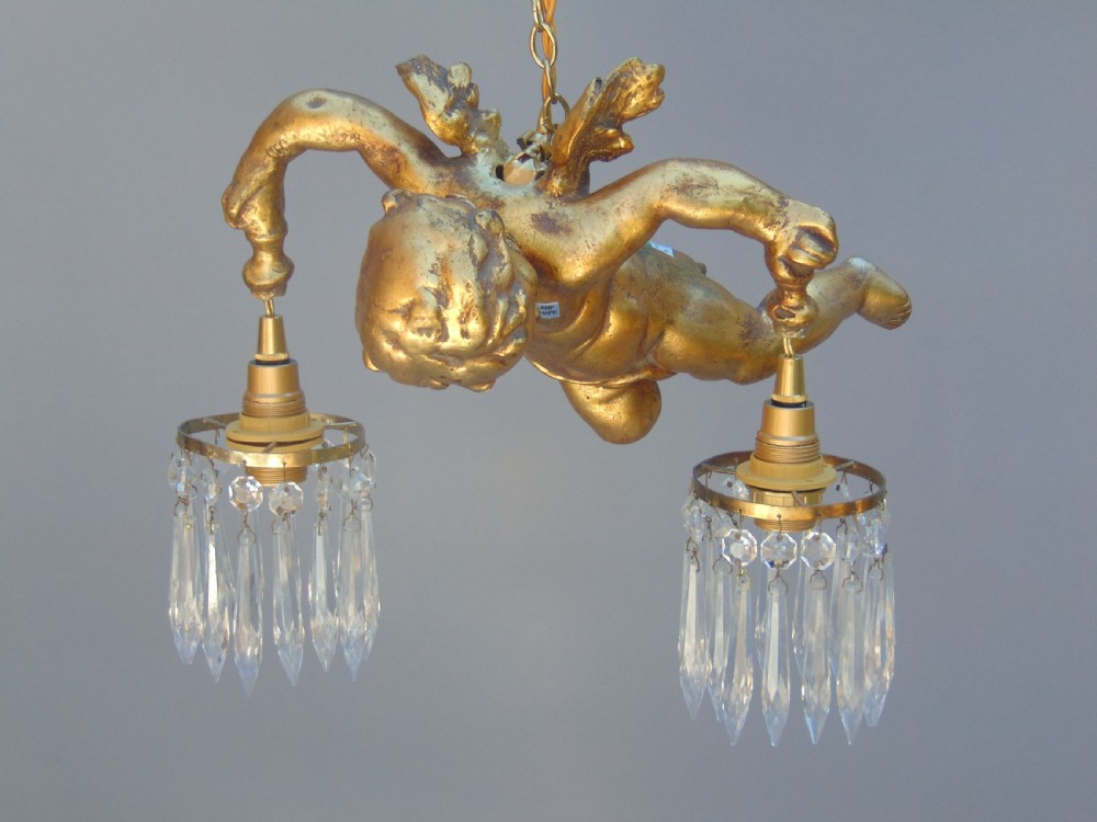 A gilded cherub ceiling light  View VII