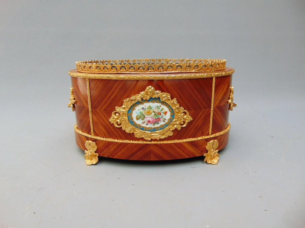 A tulipwood table planter jardinere 