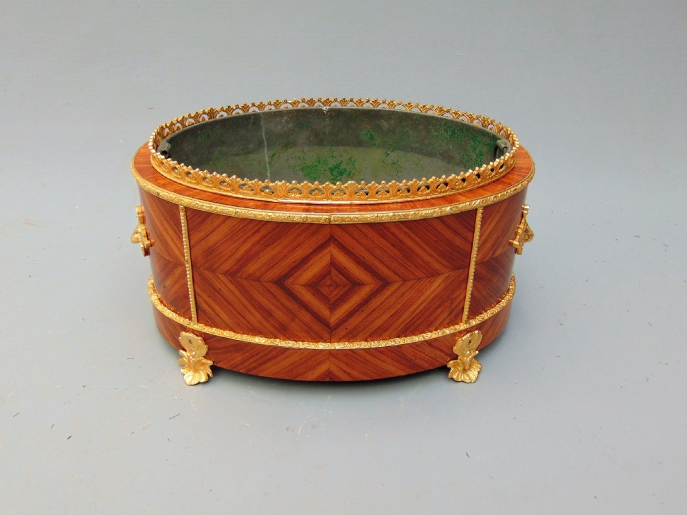 A tulipwood table planter jardinere  View IV