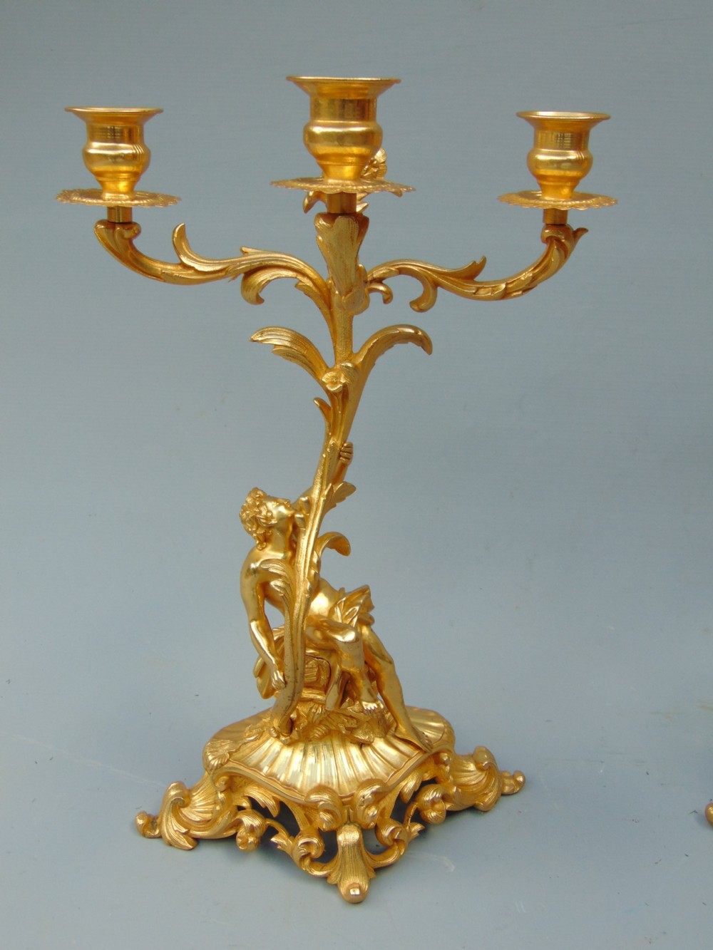 A superb pair of ormolu candlesticks  View II