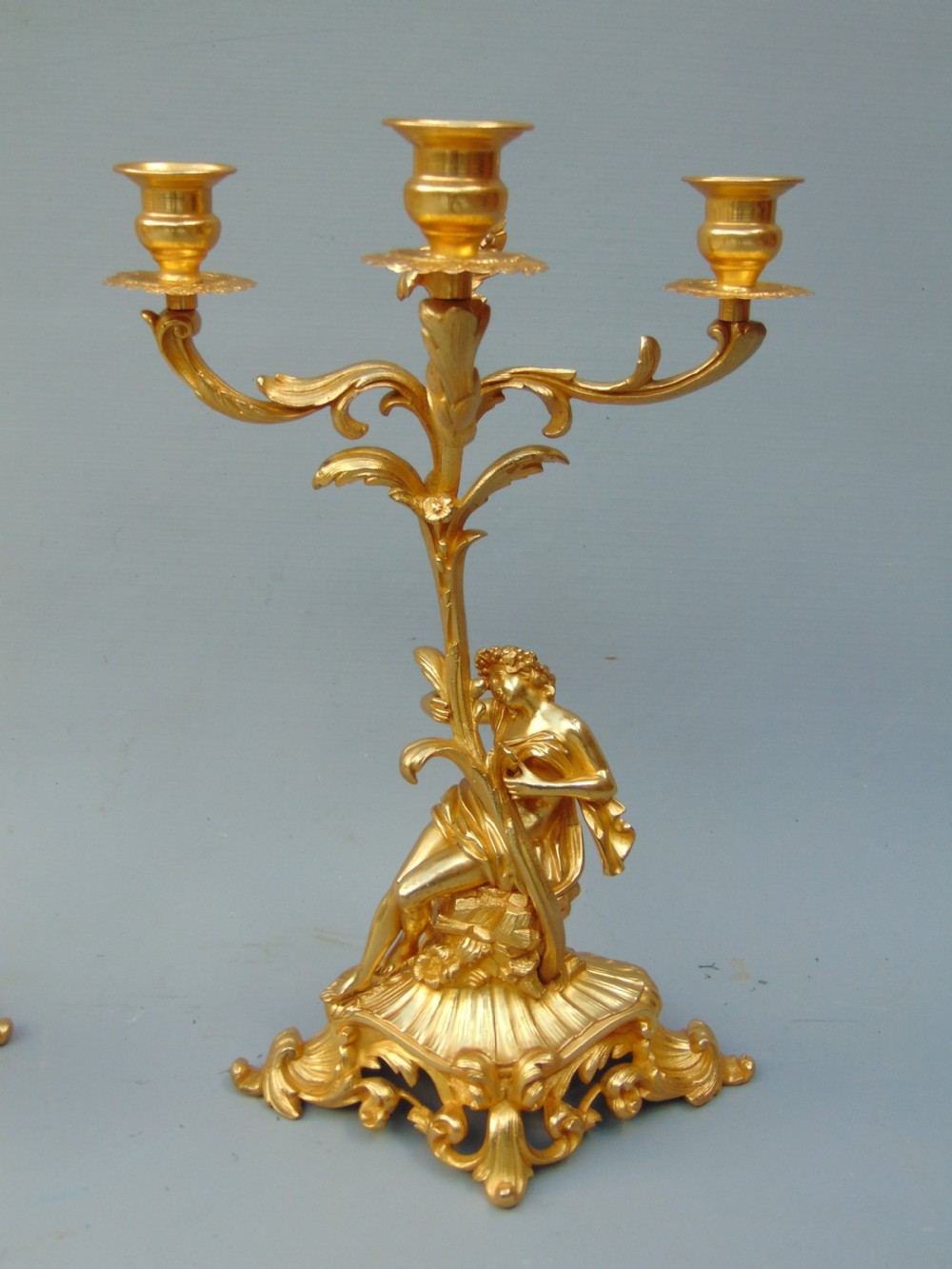 A superb pair of ormolu candlesticks  View III