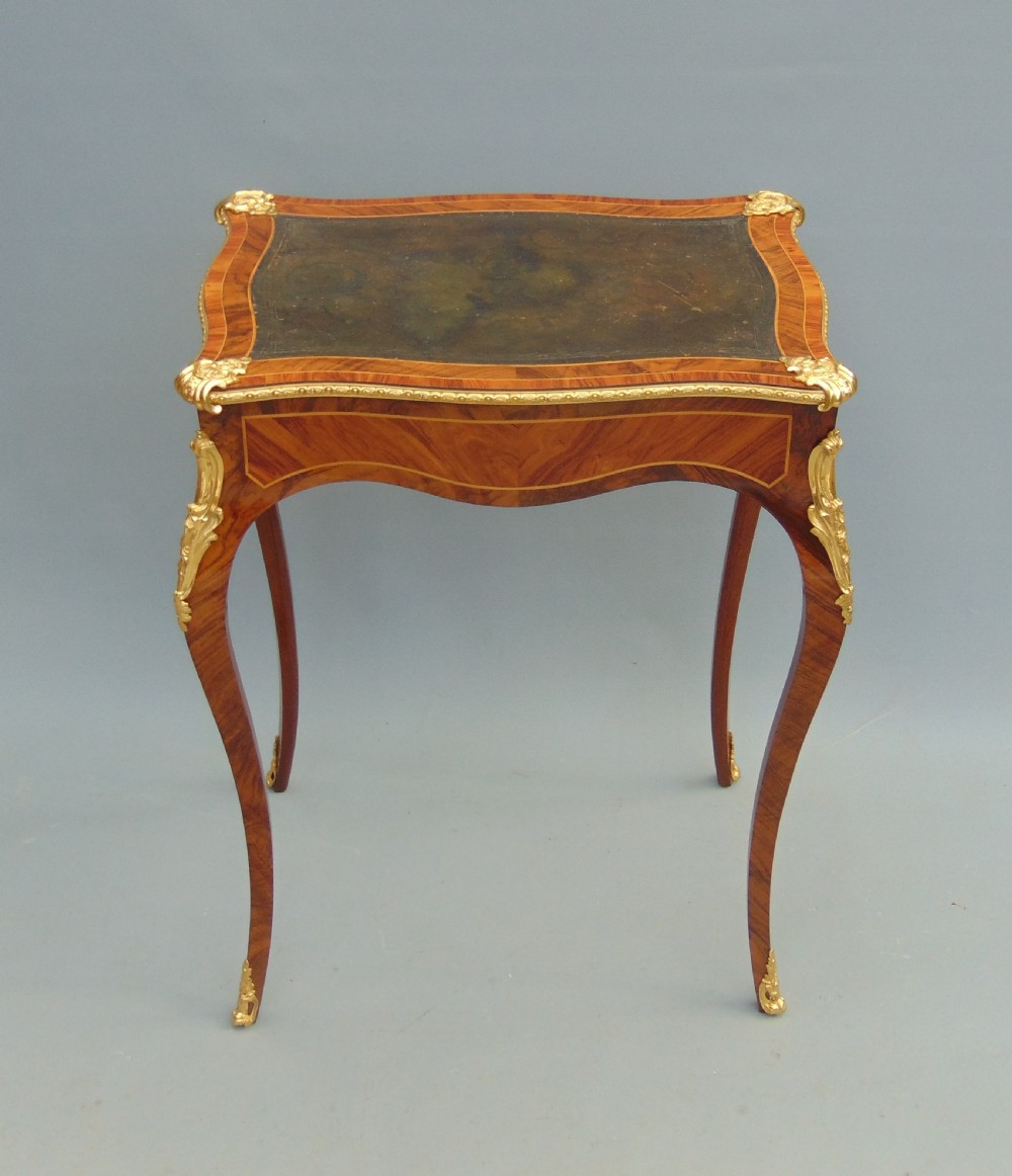 A elegant walnut writing table 