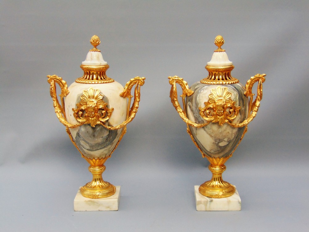 A magnificent Pair of large Marble Cassolettes Urns 