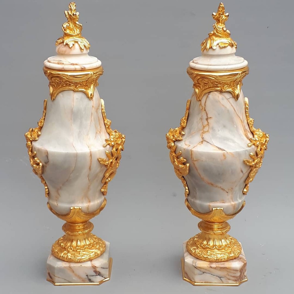 A fine pair of marble Cassolettes