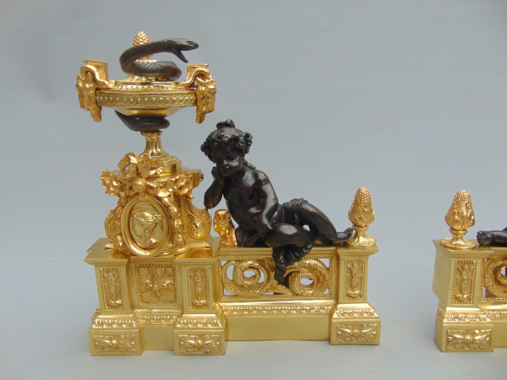 an impressive pair of Ormolu and Bronze Chenet andirons  View II