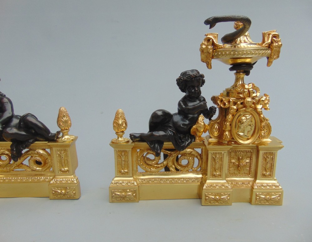 an impressive pair of Ormolu and Bronze Chenet andirons  View III
