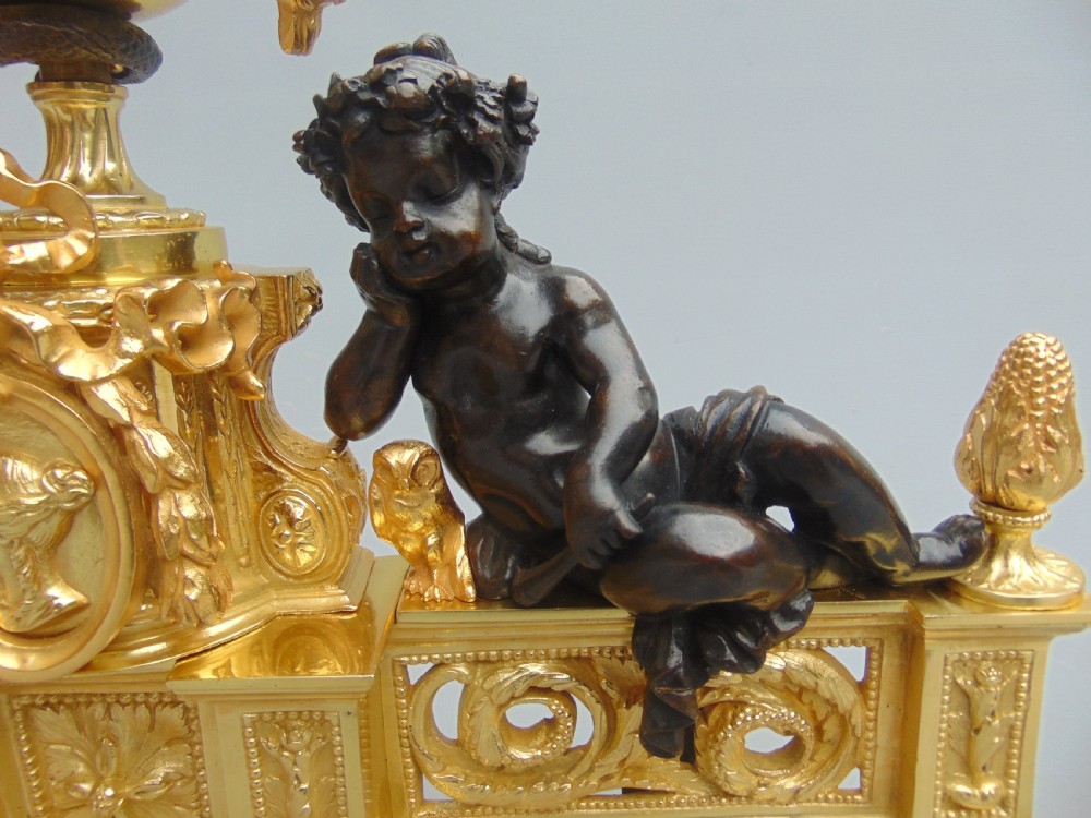 an impressive pair of Ormolu and Bronze Chenet andirons  View IV