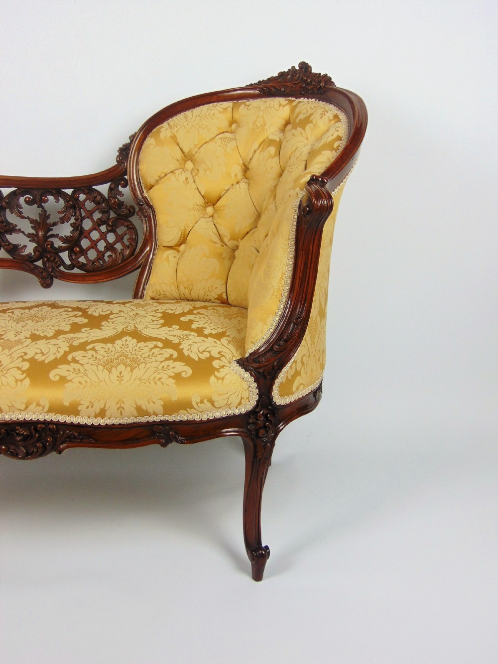 A superb walnut petite settee View II