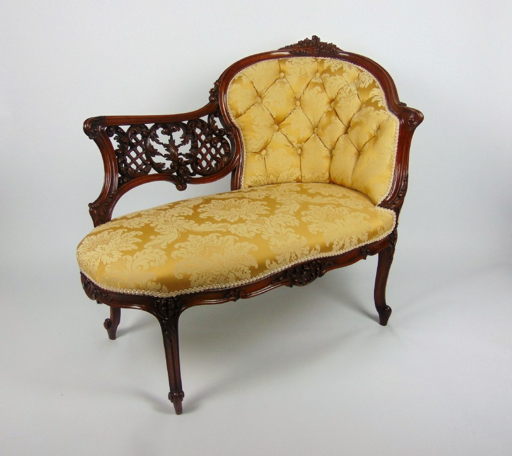 A superb walnut petite settee View III