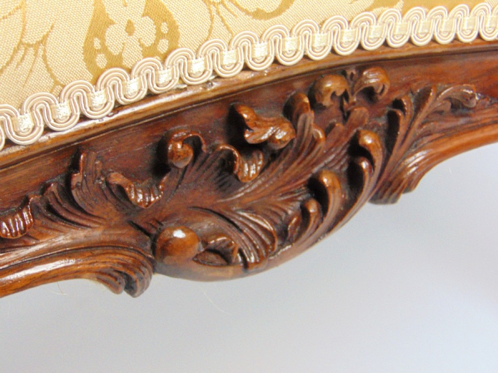 A superb walnut petite settee View VII
