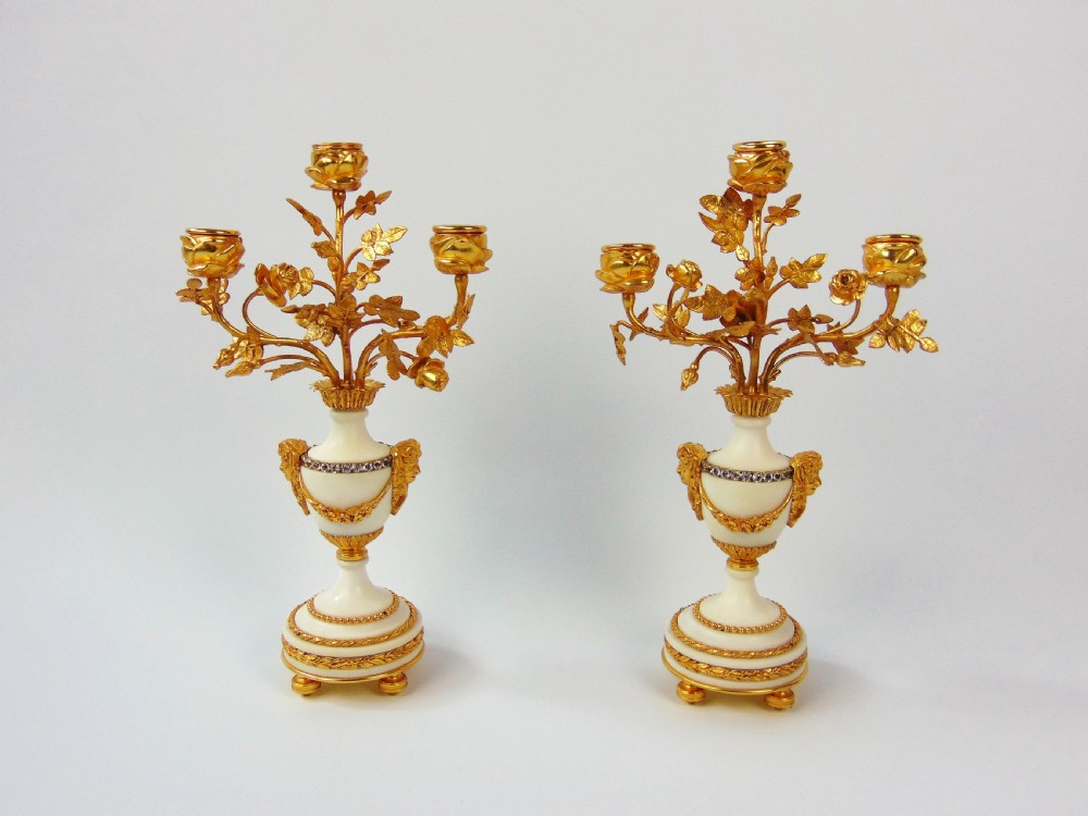 A fine pair of alabastar candlesticks