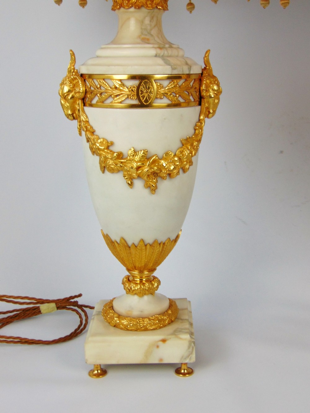 A large pair of white marble lamps  View II