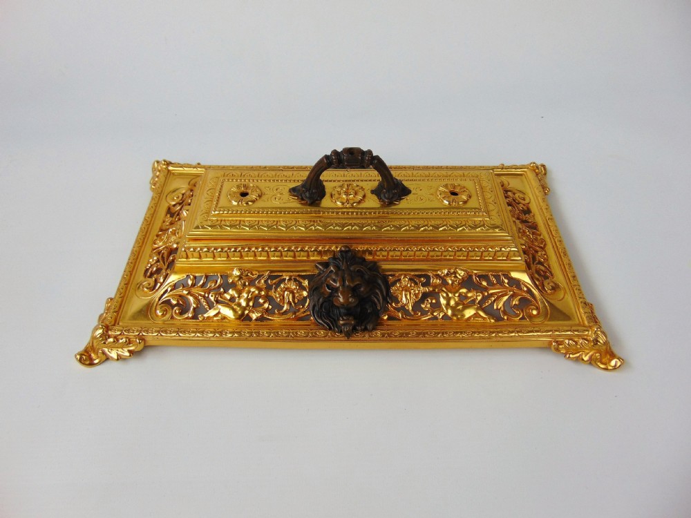 A large Gilt and Bronze Desk Stand 