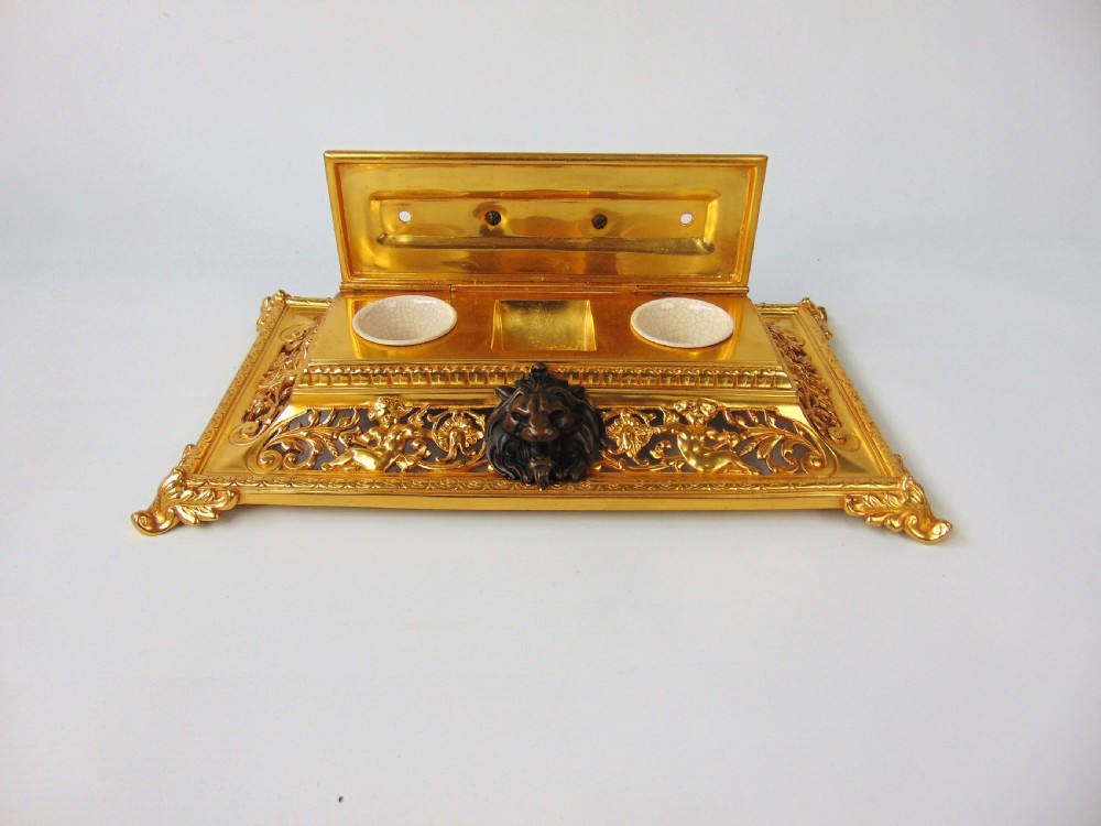 A large Gilt and Bronze Desk Stand  View II