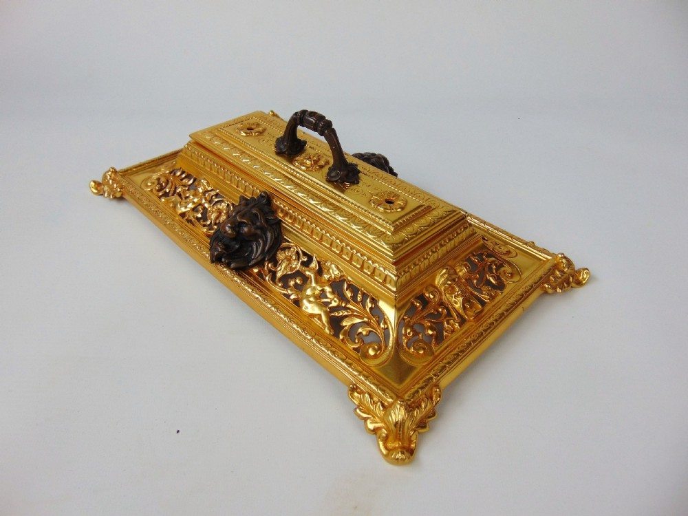 A large Gilt and Bronze Desk Stand  View III