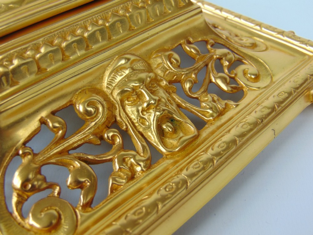 A large Gilt and Bronze Desk Stand  View V