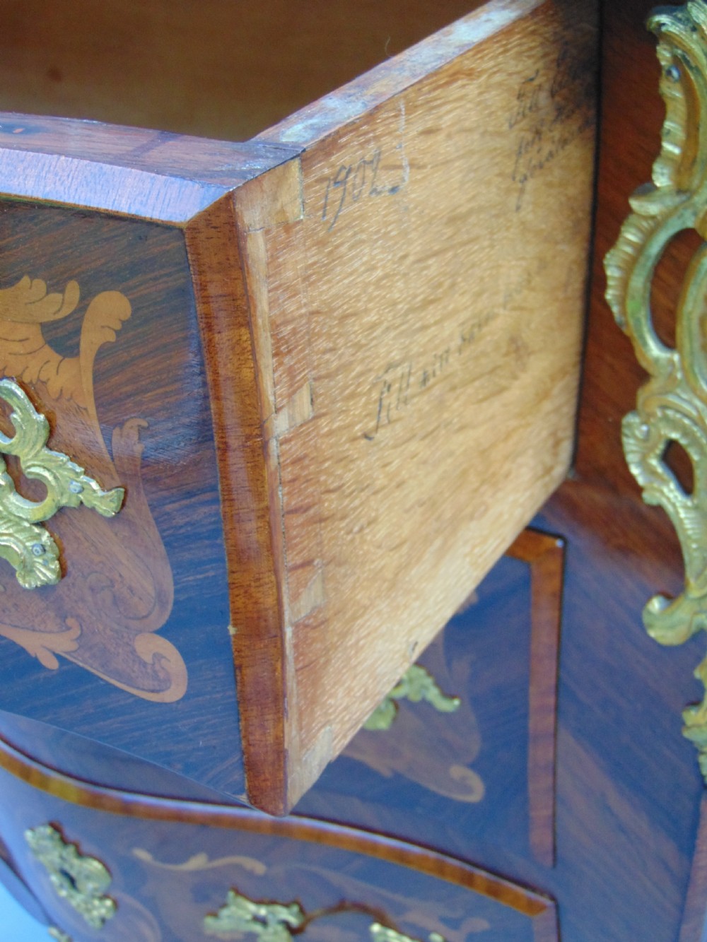 A fine  French Rosewood bombe shaped chest of drawers View VII