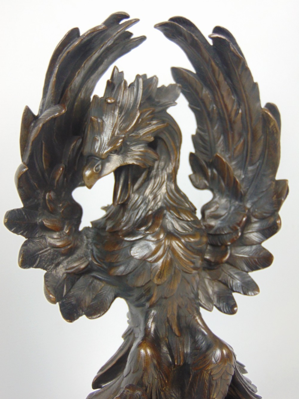 A rare pair of phoenix chenet andirons  View III