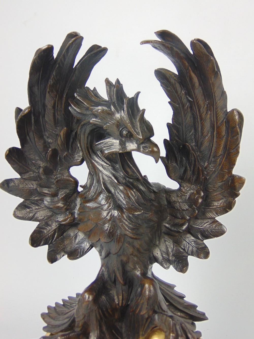 A rare pair of phoenix chenet andirons  View VI