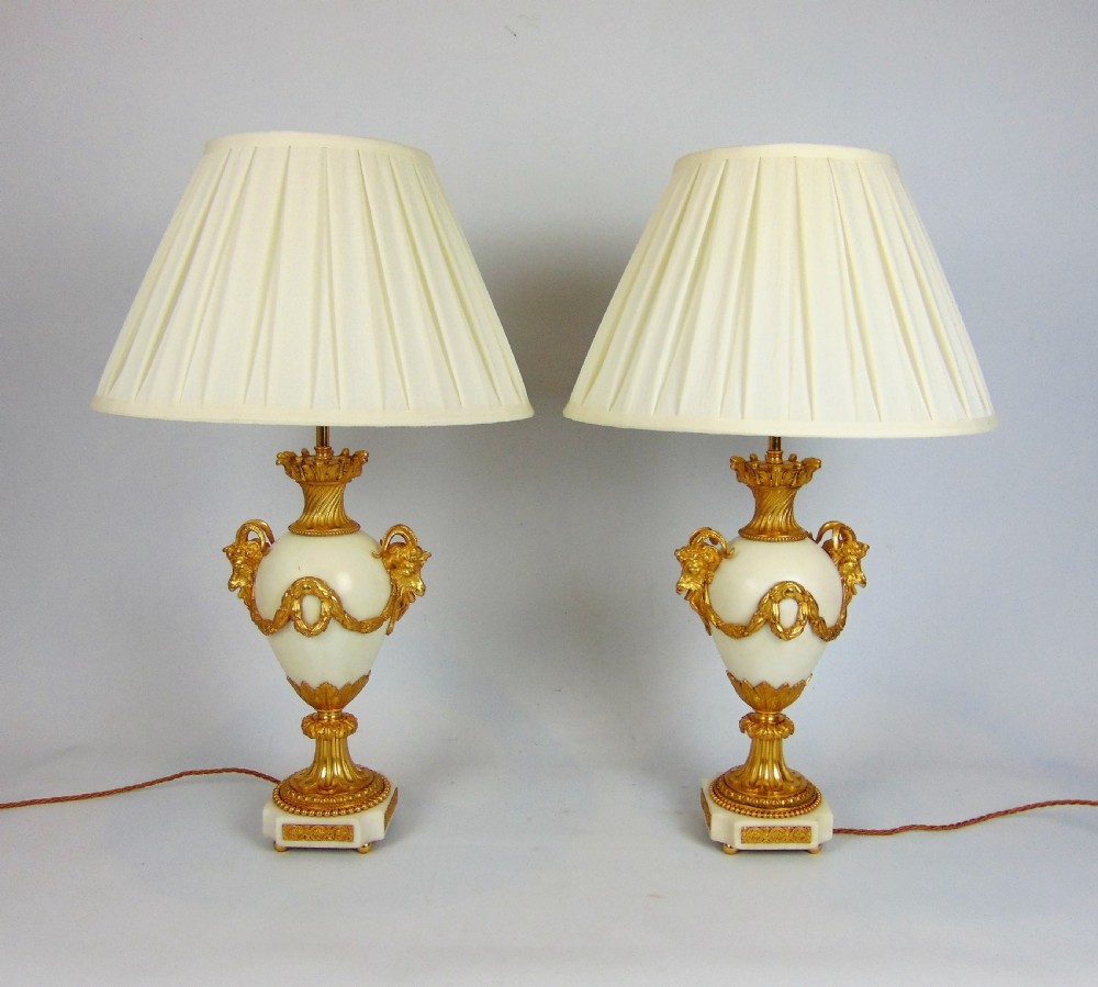 A pair of  white marble table lamps 