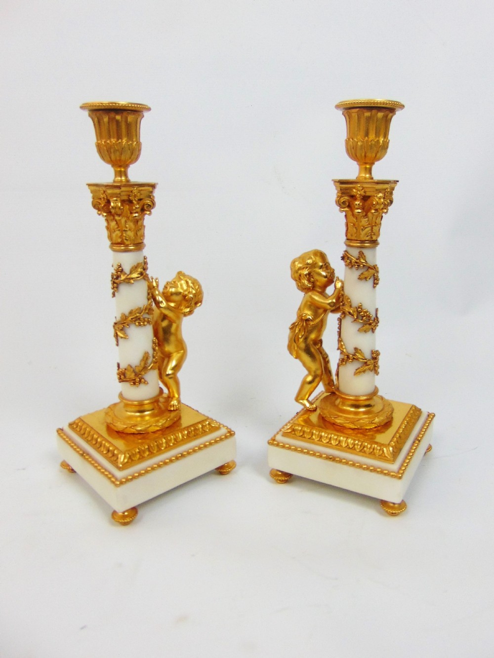 A superb pair of Marble and Ormolu Candlesticks  View III