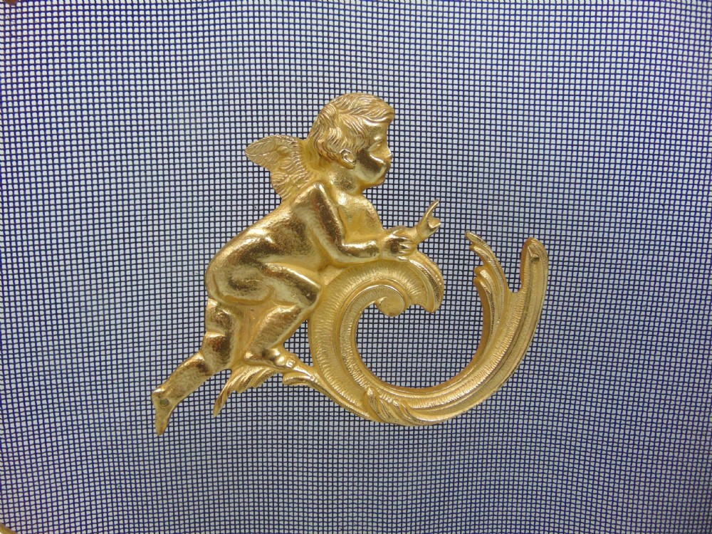 A superb gilt cherub fire screen  View III