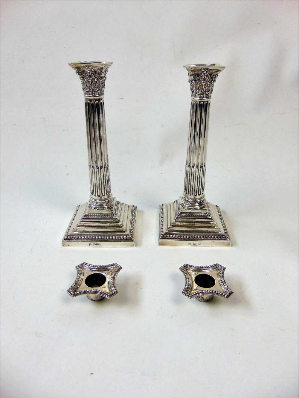  a fine pair pair of silver candlesticks by barker bros View III