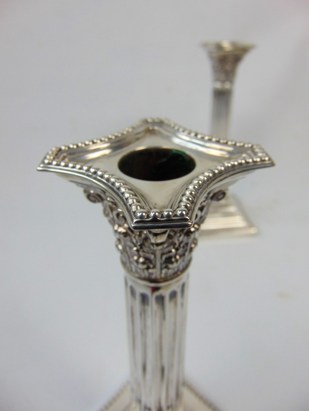  a fine pair pair of silver candlesticks by barker bros View VI
