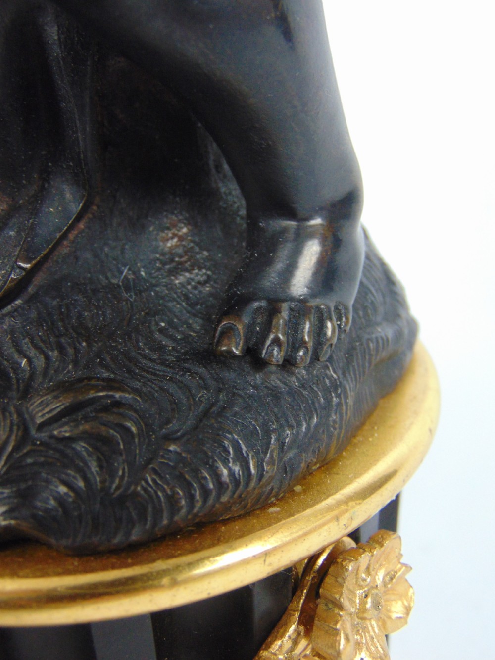 A large and good quality cherub bronze candlestick View IX