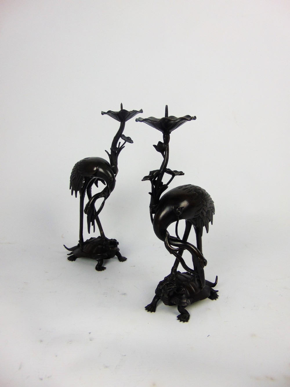 A pair of bronze candlesticks  View II