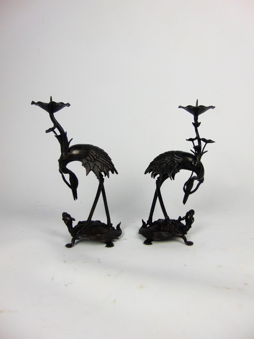 A pair of bronze candlesticks  View III