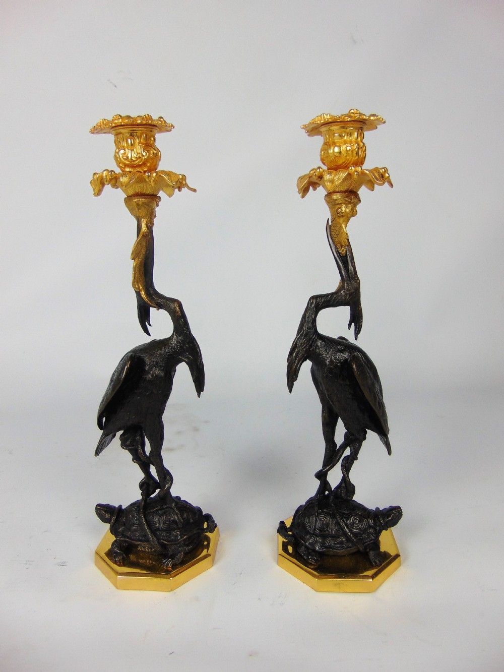 A quality Pair of bronze crane candlesticks View II
