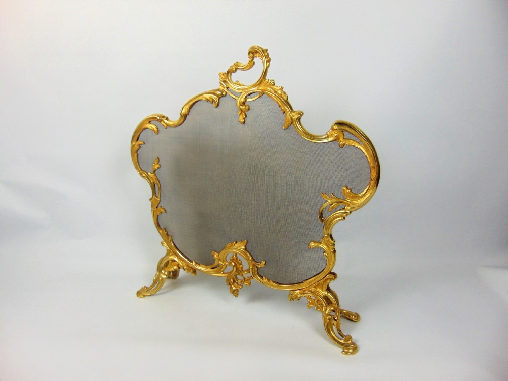 A fine gilt fire screen  View II