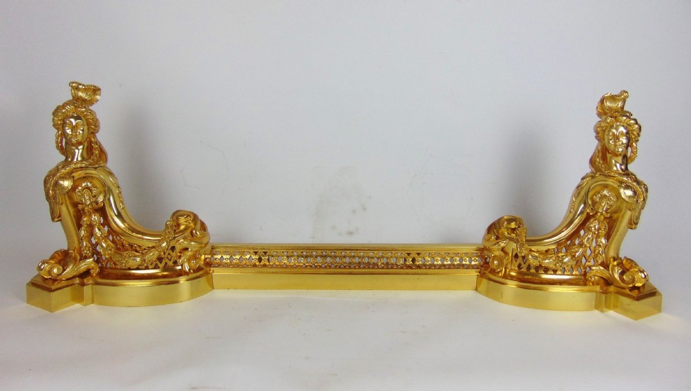 A superb Gilt bronze figural Chenet fender