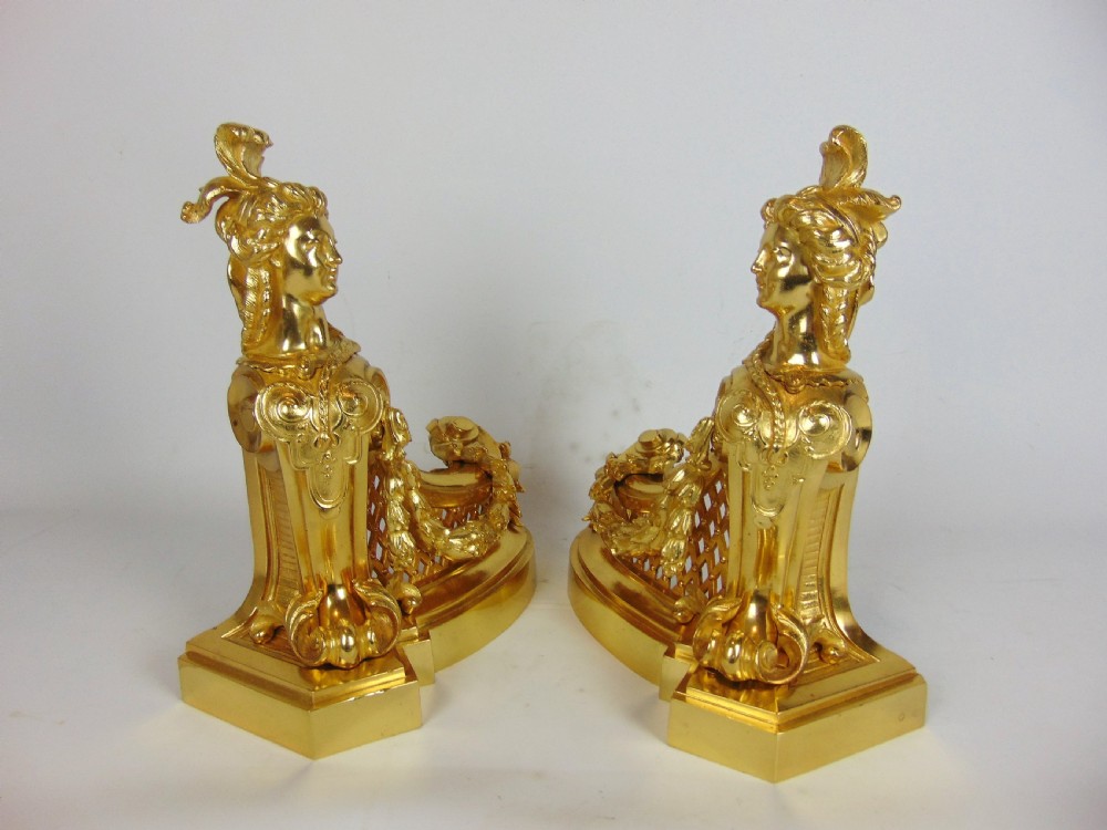 A superb Gilt bronze figural Chenet fender View IX
