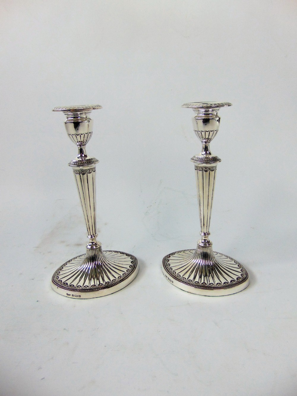 a FINE PAIR OF ELKINGTON SILVER CANDLESTICKS  View IV