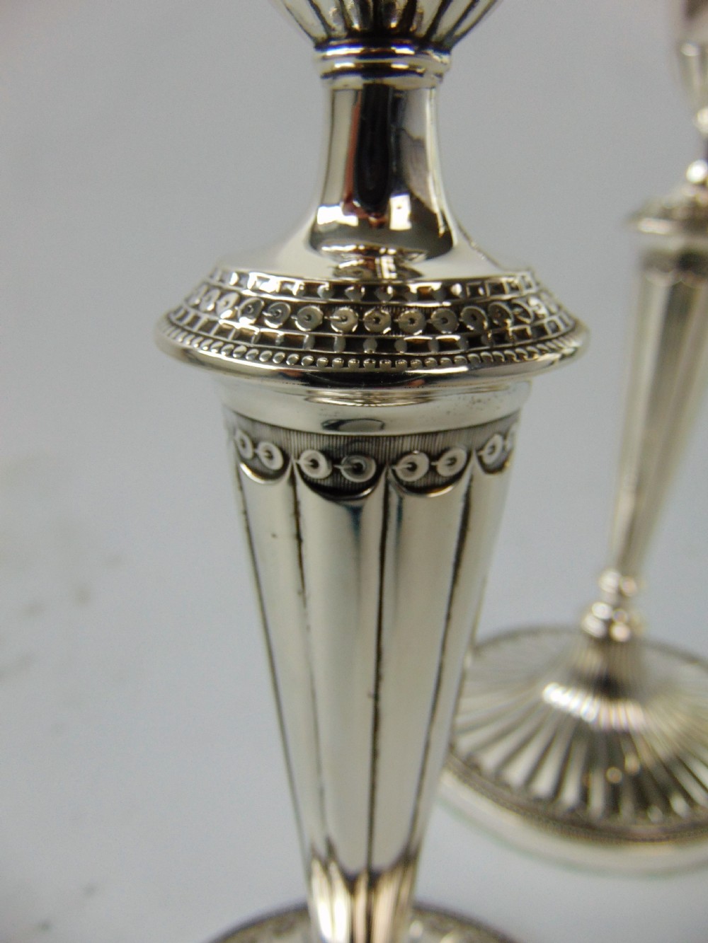 a FINE PAIR OF ELKINGTON SILVER CANDLESTICKS  View VIII