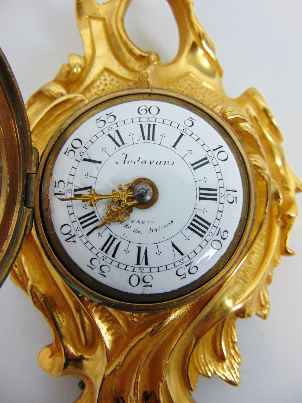 A gilt bronze cartel clock View II