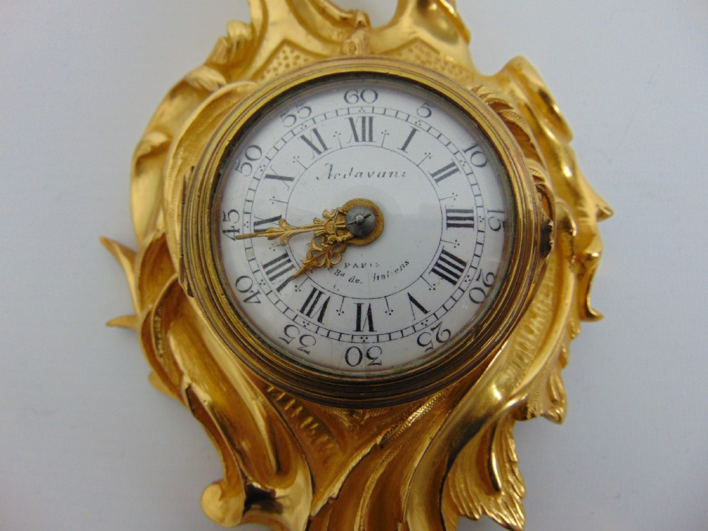 A gilt bronze cartel clock View IV