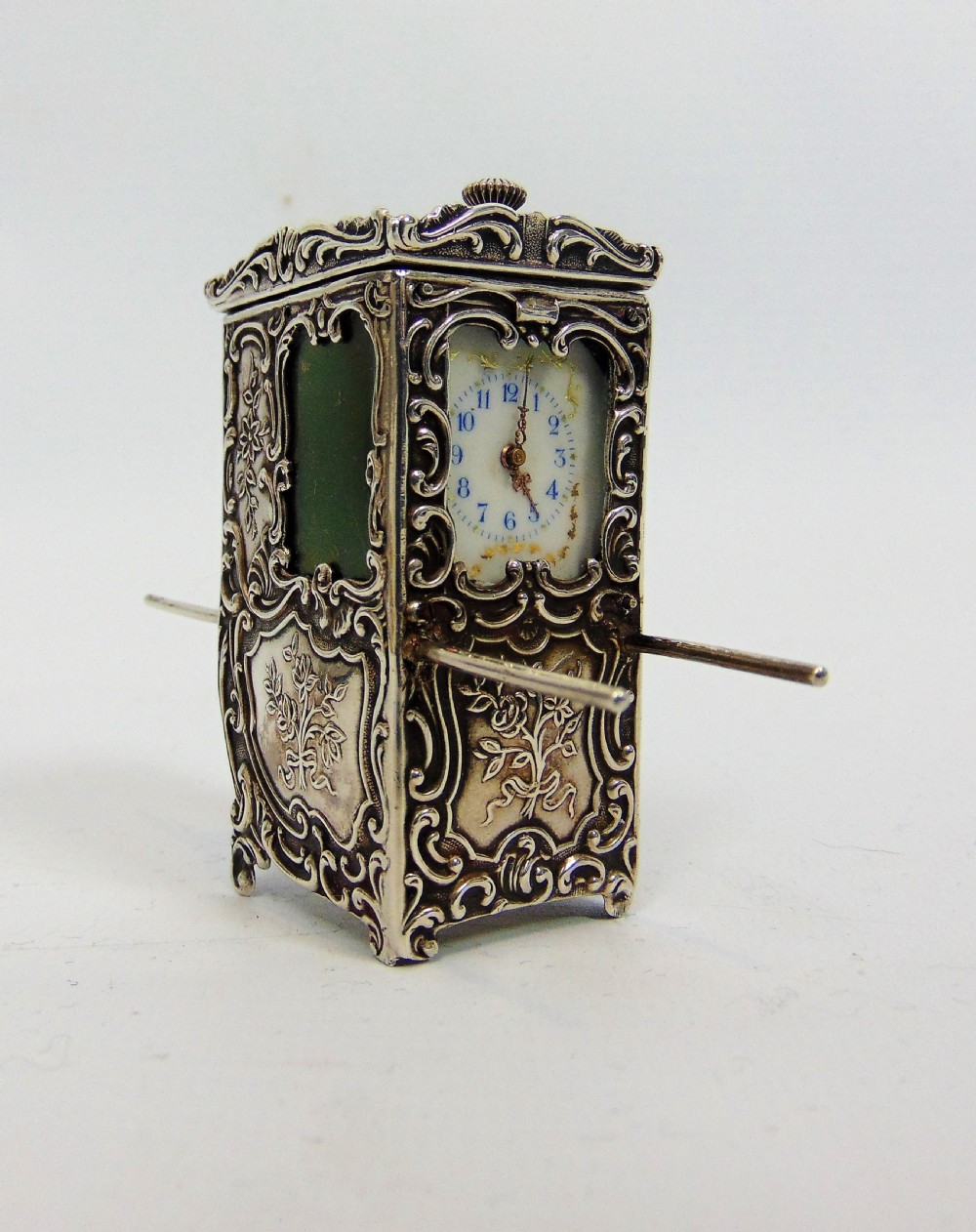 A superb silver miniature swiss sedan clock