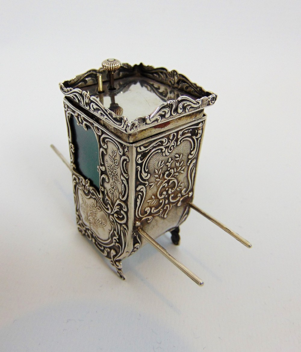 A superb silver miniature swiss sedan clock View VI