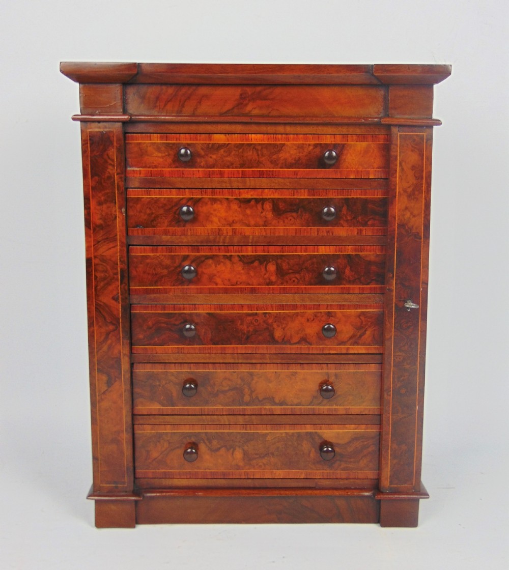 A rare walnut miniature collectors wellington chest  View II